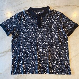 Prada polo shirt size XXL. I am reposhing this item because it fits like a Large